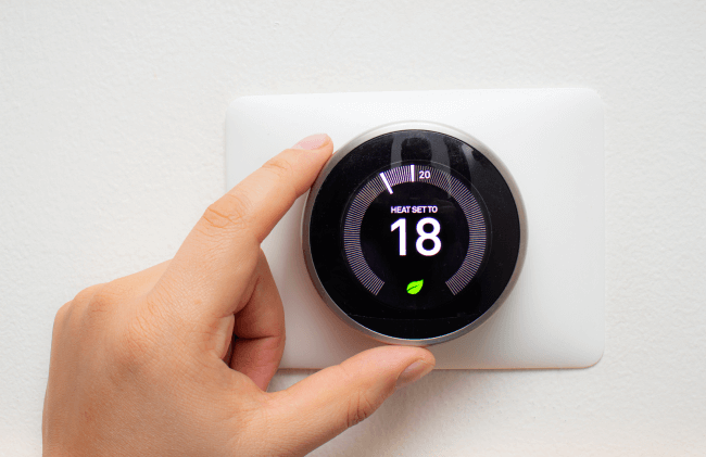 Smart Thermostat with a person saving energy