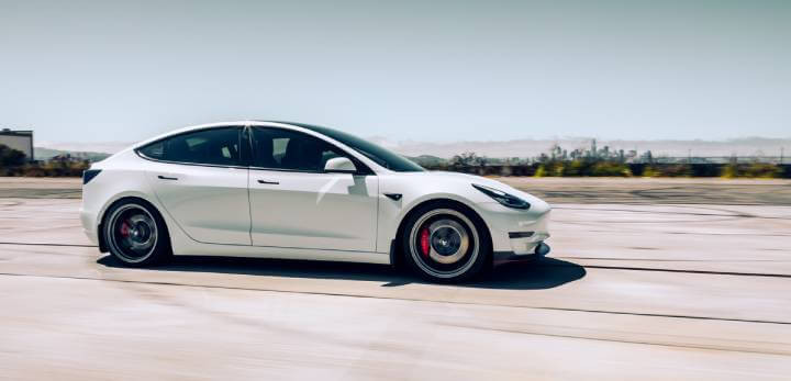 White Tesla Model 3 cruising through Los Angeles, CA - Captured on 4th December 2022.