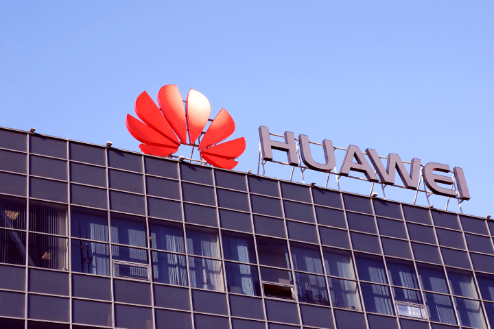 Huawei Telecom Company Logo on Moscow Office Building Under a Clear Blue Sky - August 30, 2019, Russia